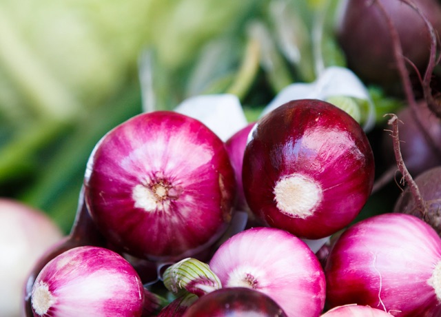 medium shot of   a pile of radishes and beets